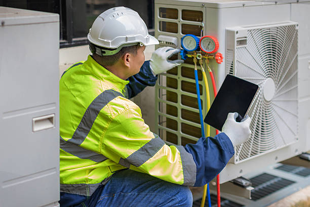 Professional Hvac Maintenance technician working in South Walpole, MA